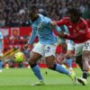 City's Semenyo and United's Dorgu in action